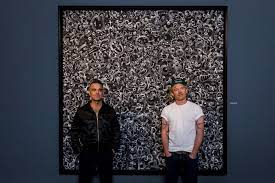 Robbie Williams and Ed Godrich debut art exhibition 